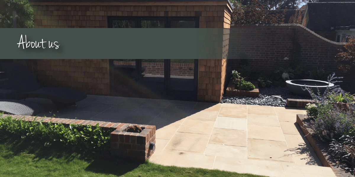 Beige garden paving with about us banner