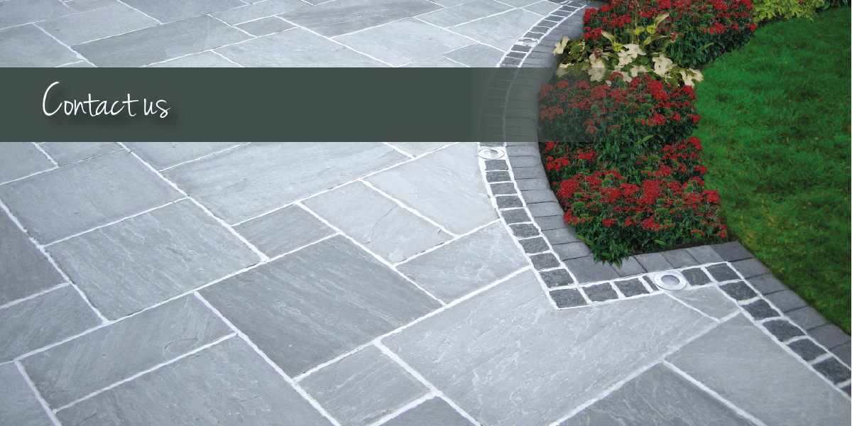 Grey paving with flowers and contact us banner